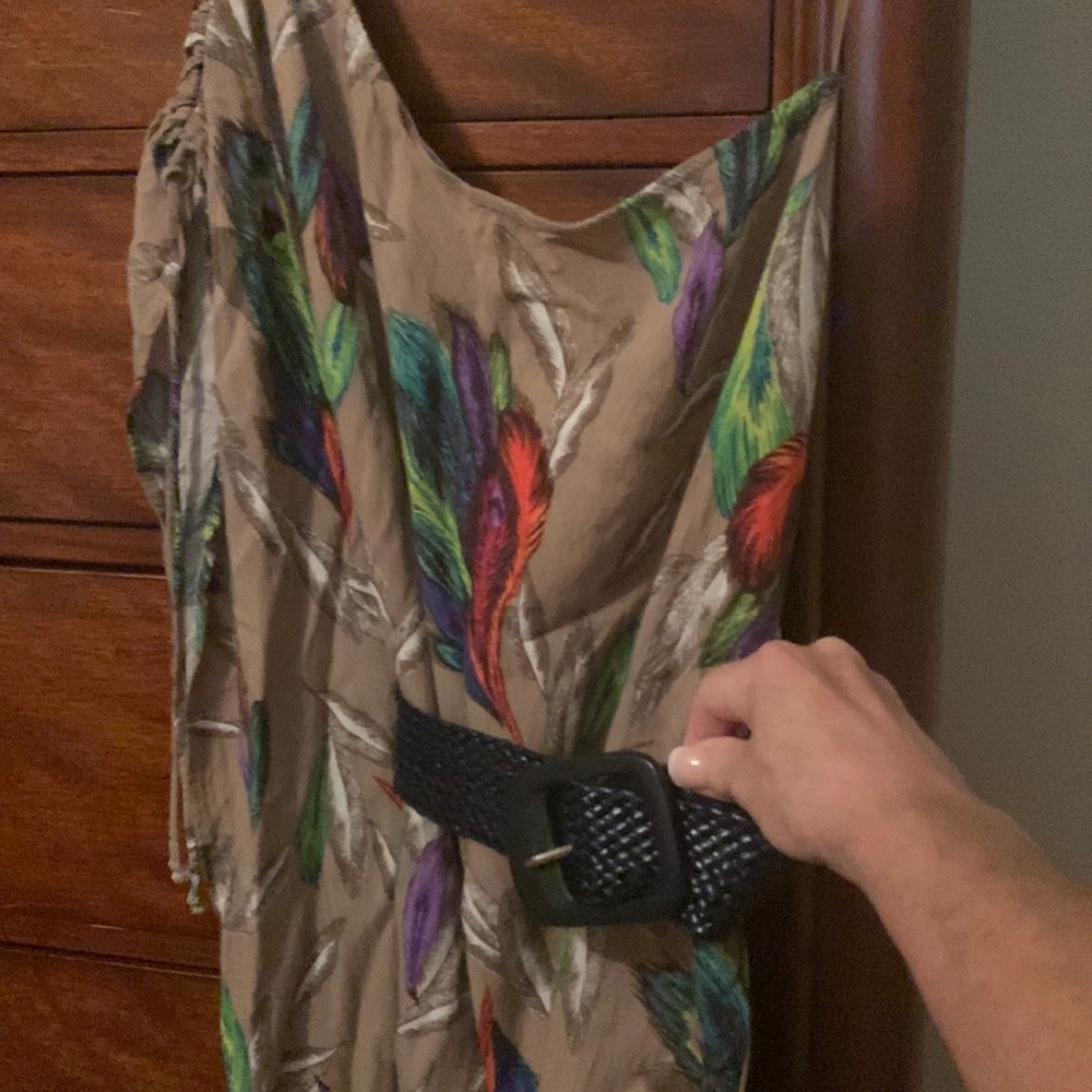One shoulder tropical print blouse with removable navy colored belt.